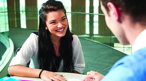 student and advisor talking